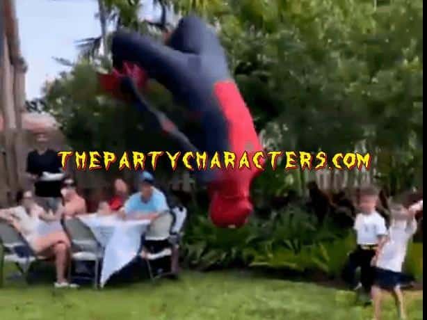spiderman entertaining kids with a gymnastics flip 