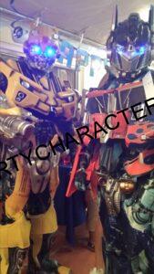 Transformer characters Optimus Prime and Bumblebee at a Pembroke Pines birthday party